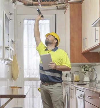 Home inspector examining property in BC